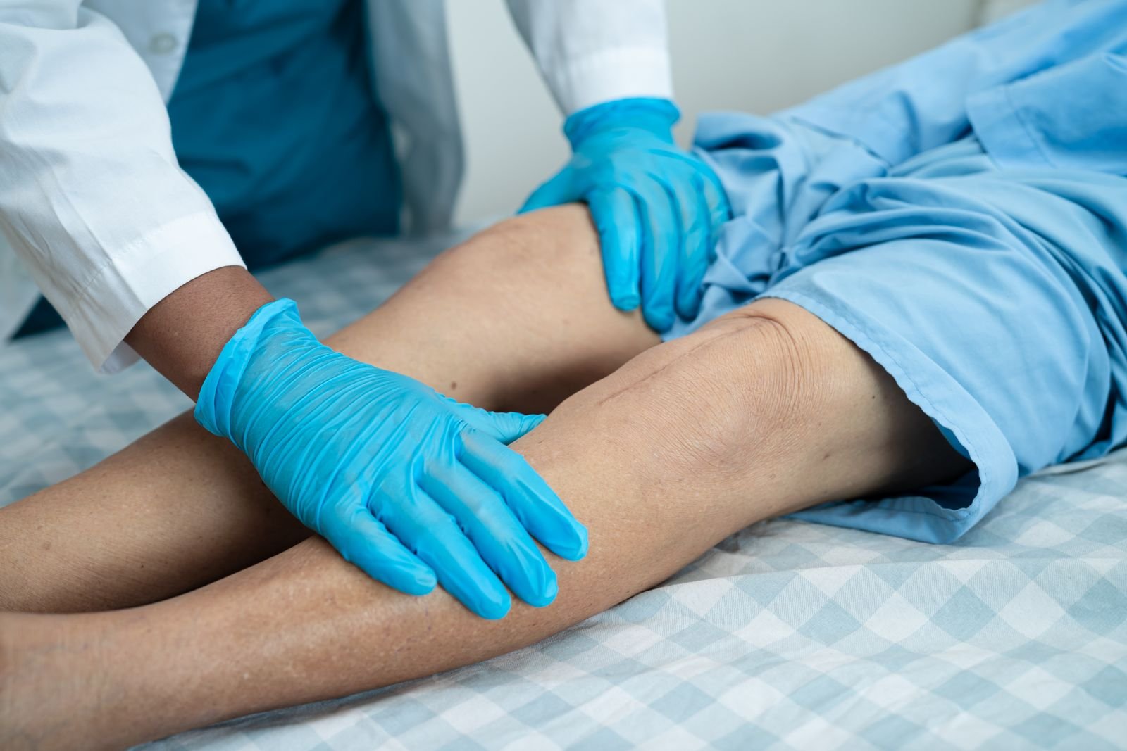Chiropractor performing a gentle neck and upper-back adjustment