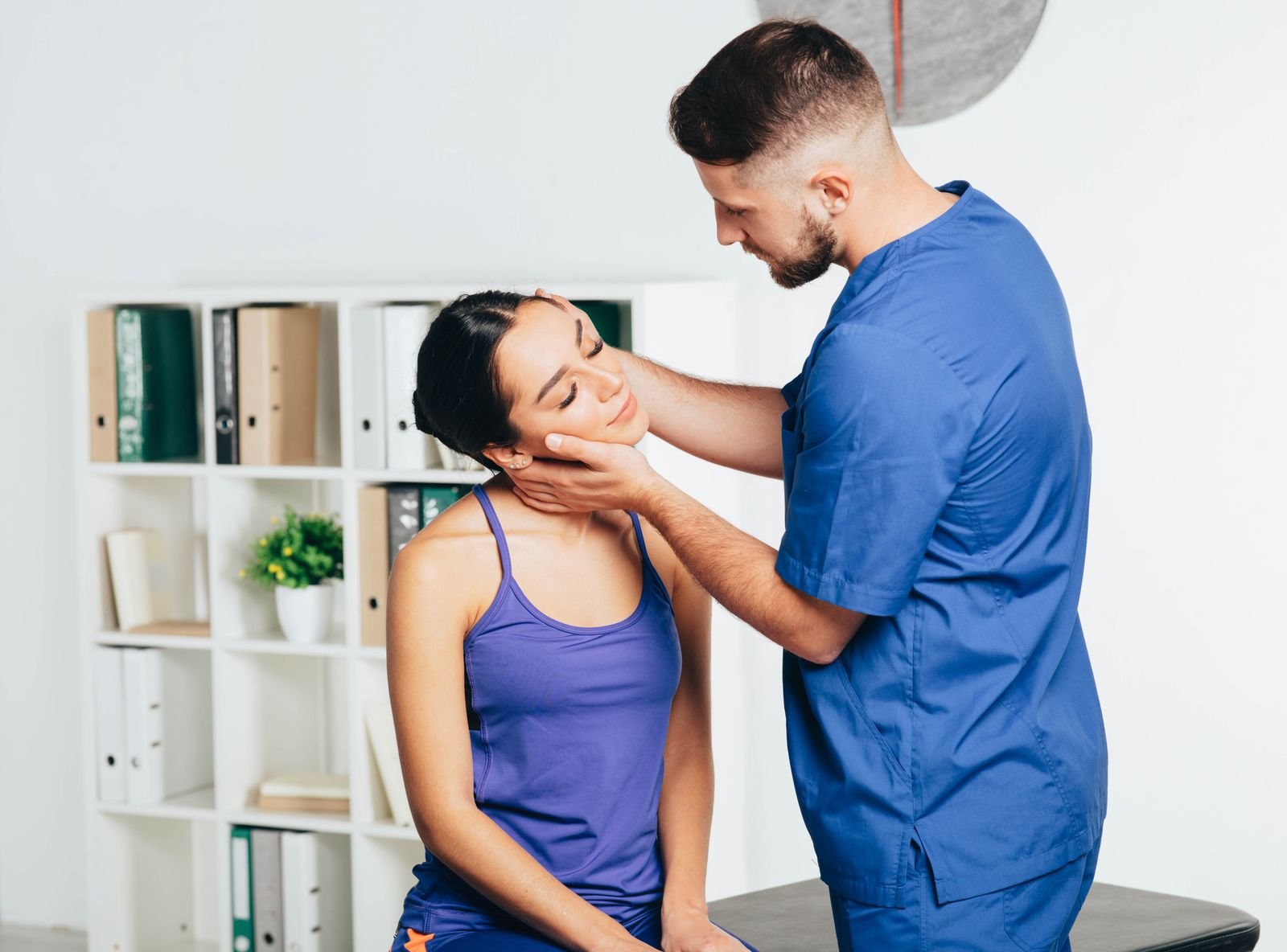 Therapist and patient during a tmj treatment appointment in Abbotsford
